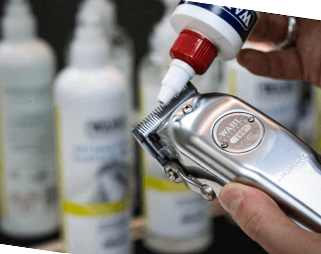 Wahl Clipper Blades being oiled