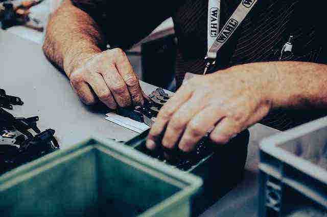 wahl factory employee assembling wahl clipper